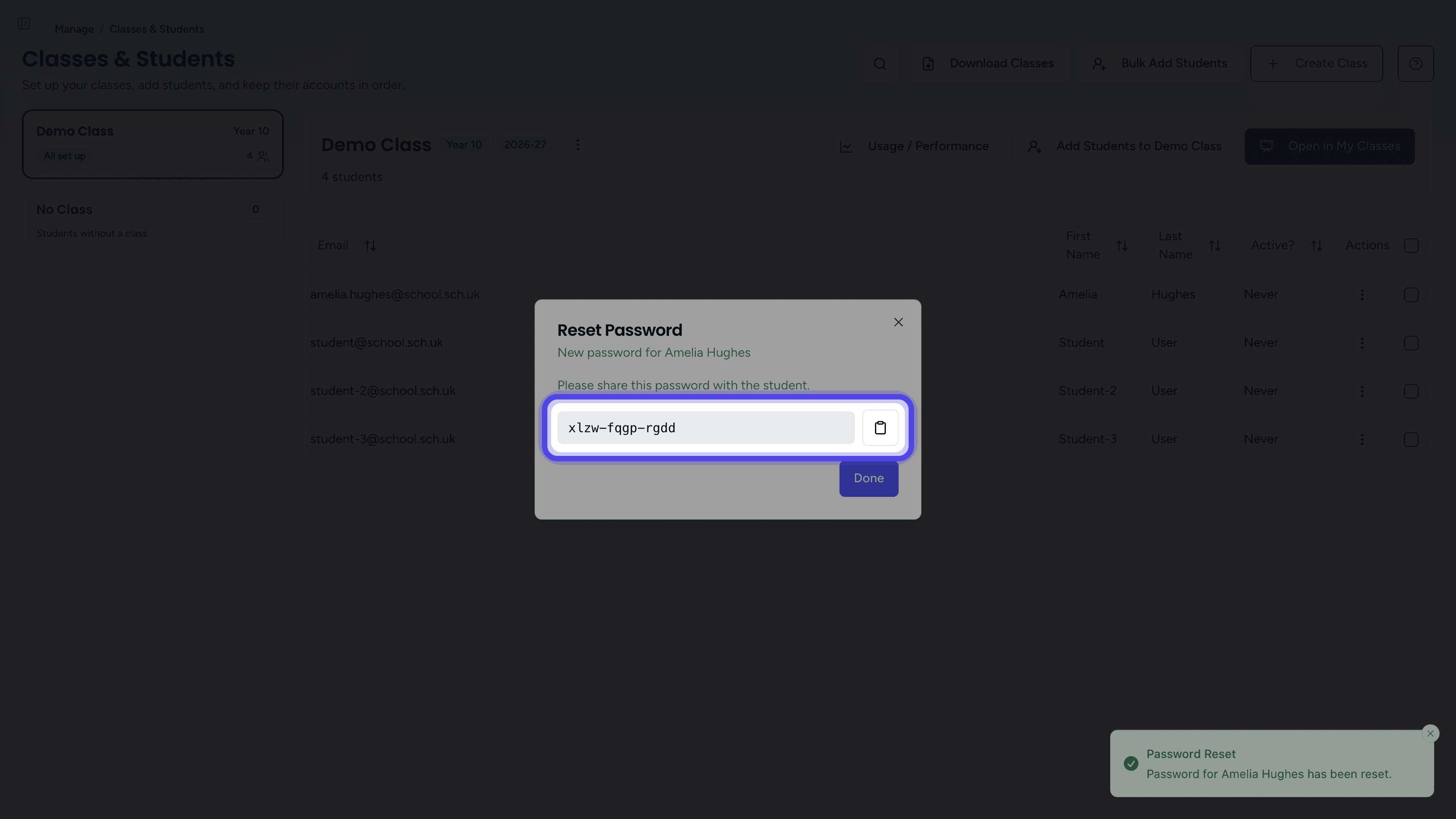 The Reset Password dialog showing the new password and its copy button